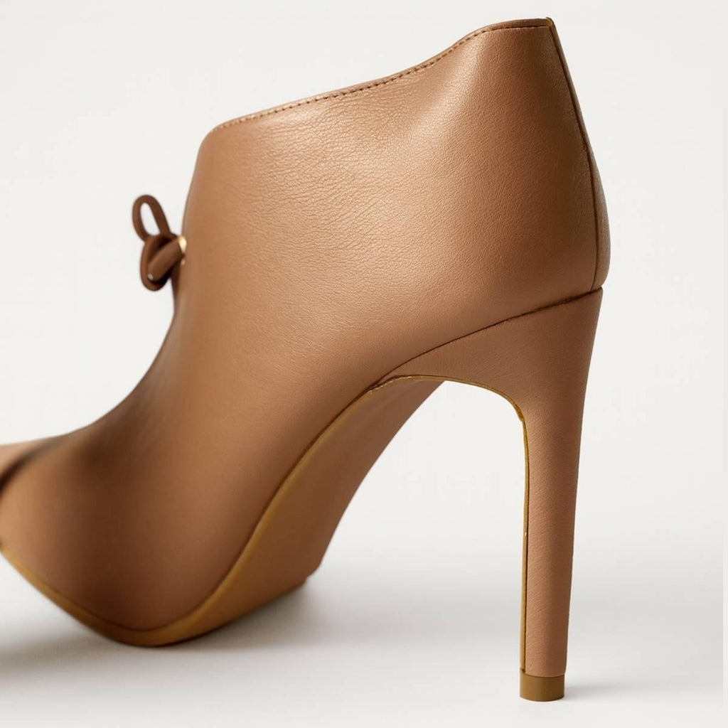 Back view of Oh! Divine nude stiletto heel highlighting elegant curve and refined stitching design.