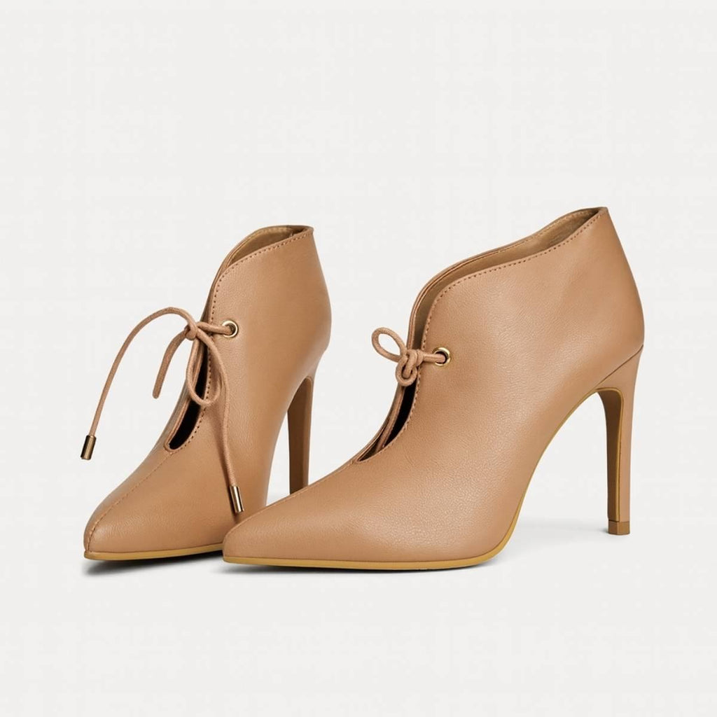 Elegant pair of Oh! Divine nude pointed-toe stiletto heels showcasing luxurious Afro-luxury craftsmanship.