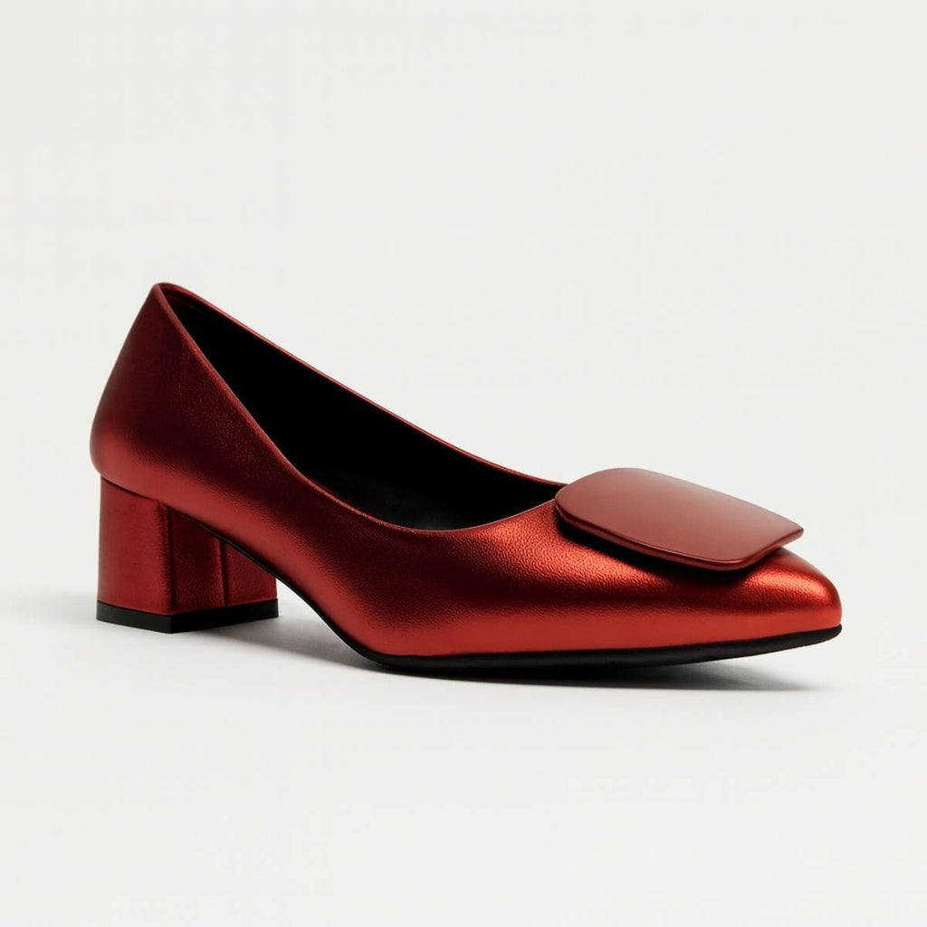 Angled view of Amani Crimson Block Heels featuring metallic red finish and block heel
