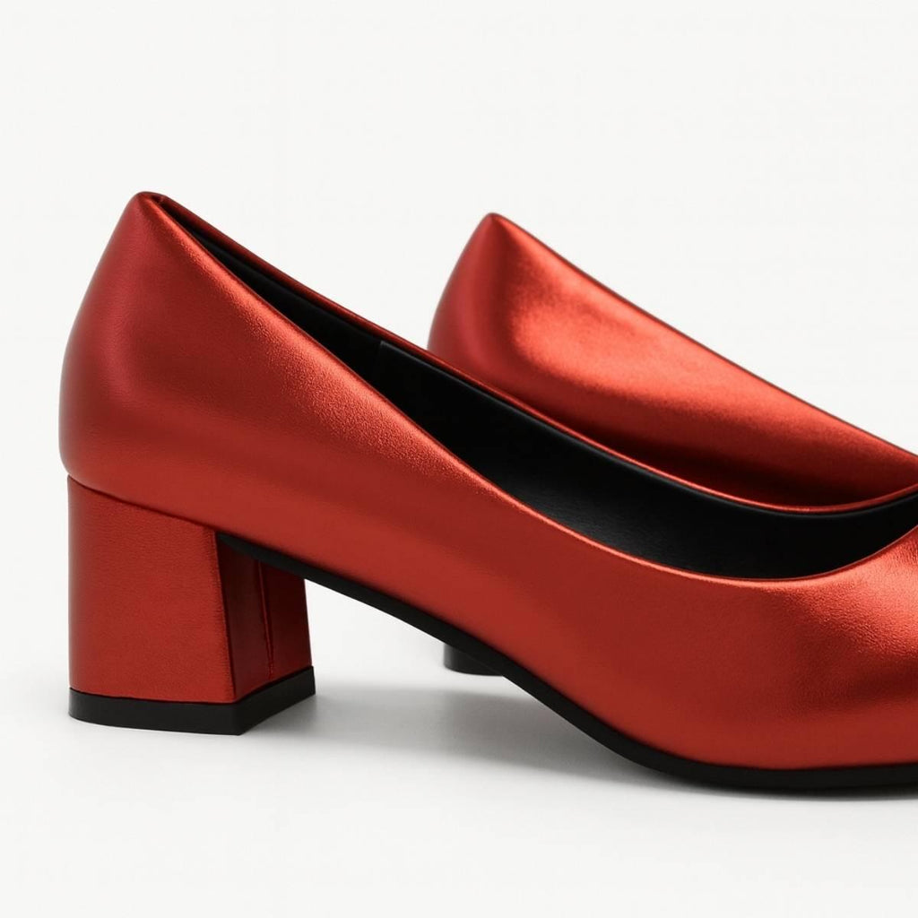 Close-up of Amani Crimson Block Heels showing detailed texture and block heel design