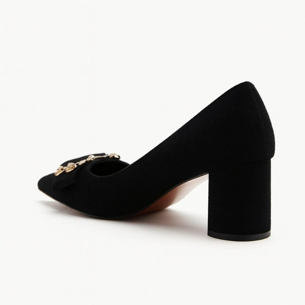 Back angle showing Amara Noir Chain Block Heels with smooth block heel design.