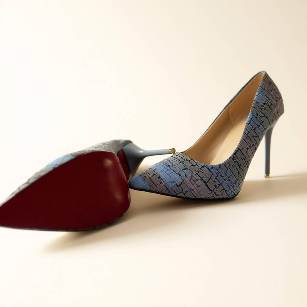 Pair of Oh! Divine Amara Textured Sky Heels with red sole and sky-blue crack pattern for elevated style.