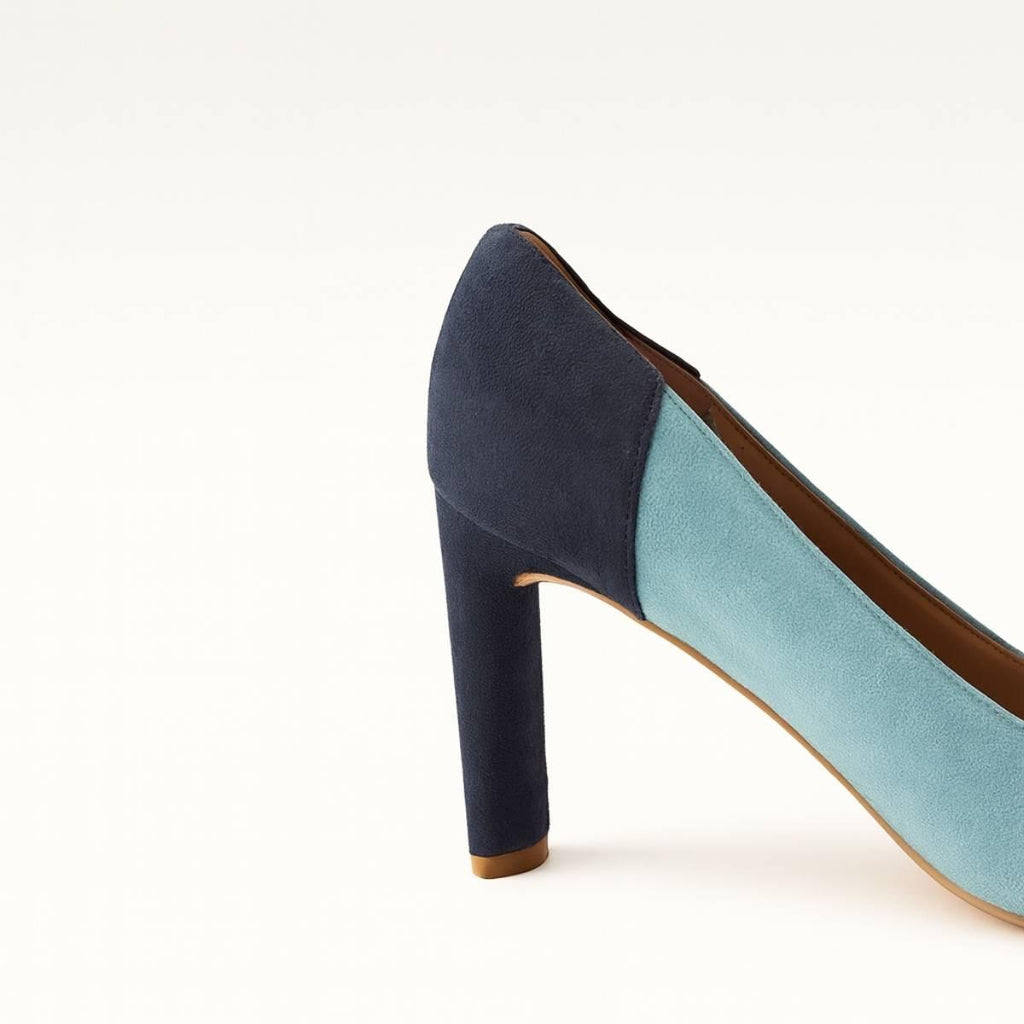 Close-up of Aria Blue Two-Tone Suede Heels with detailed stitching and faux suede texture.