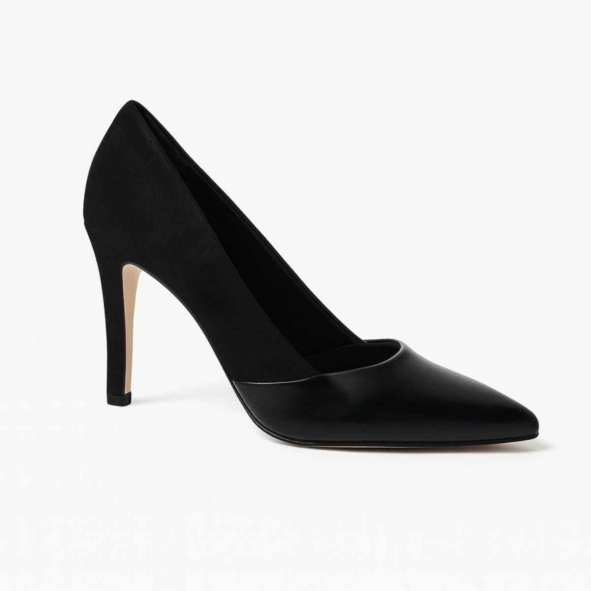 Angled view of Oh! Divine Aria Noir black stiletto pump showing sleek heel and polished leather-suede contrast.