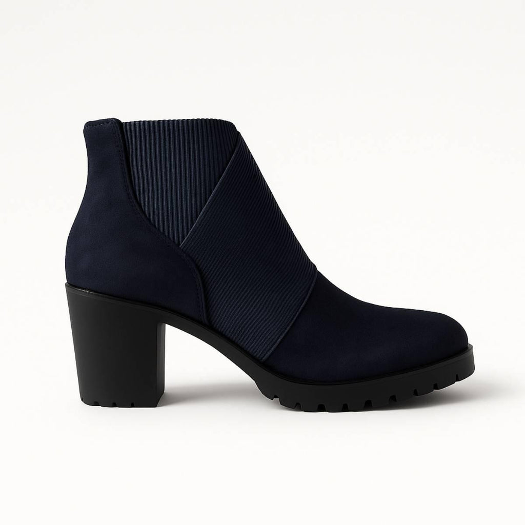 Celeste Navy Block Heel Ankle Boots side view with rugged sole and modern silhouette.