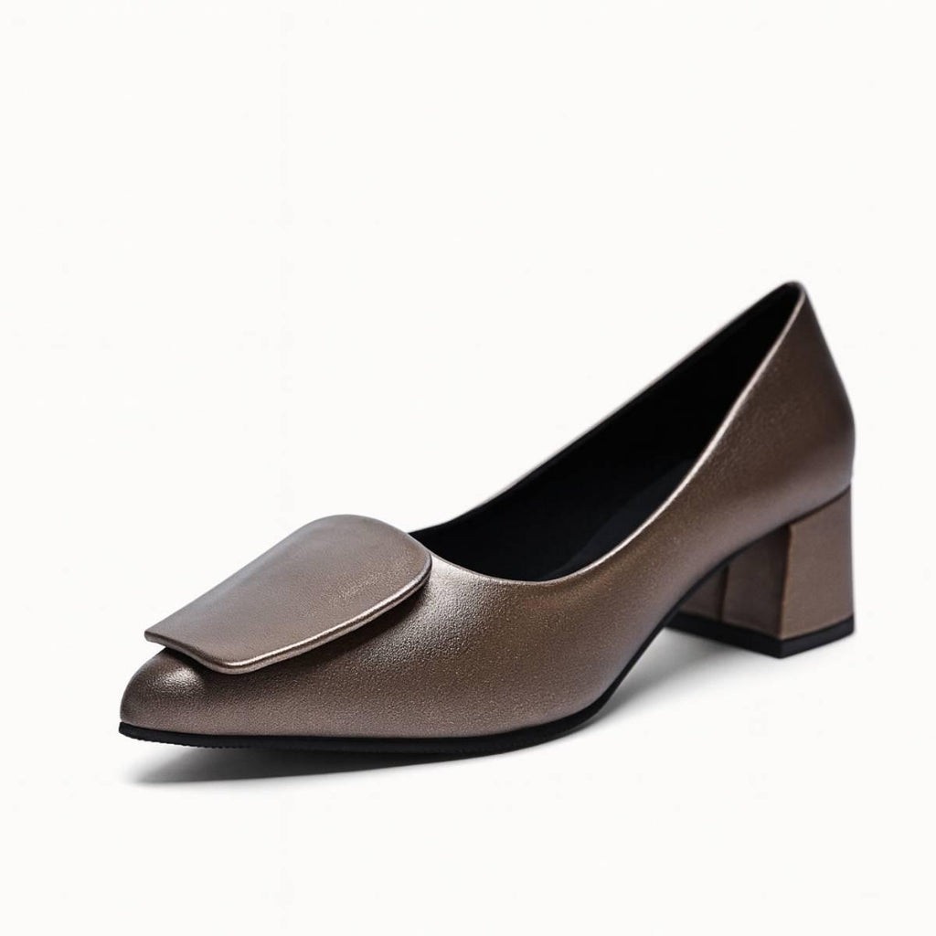 Detailed angle of Elara Bronze Sculpted Block Heel capturing the metallic texture and geometric design.