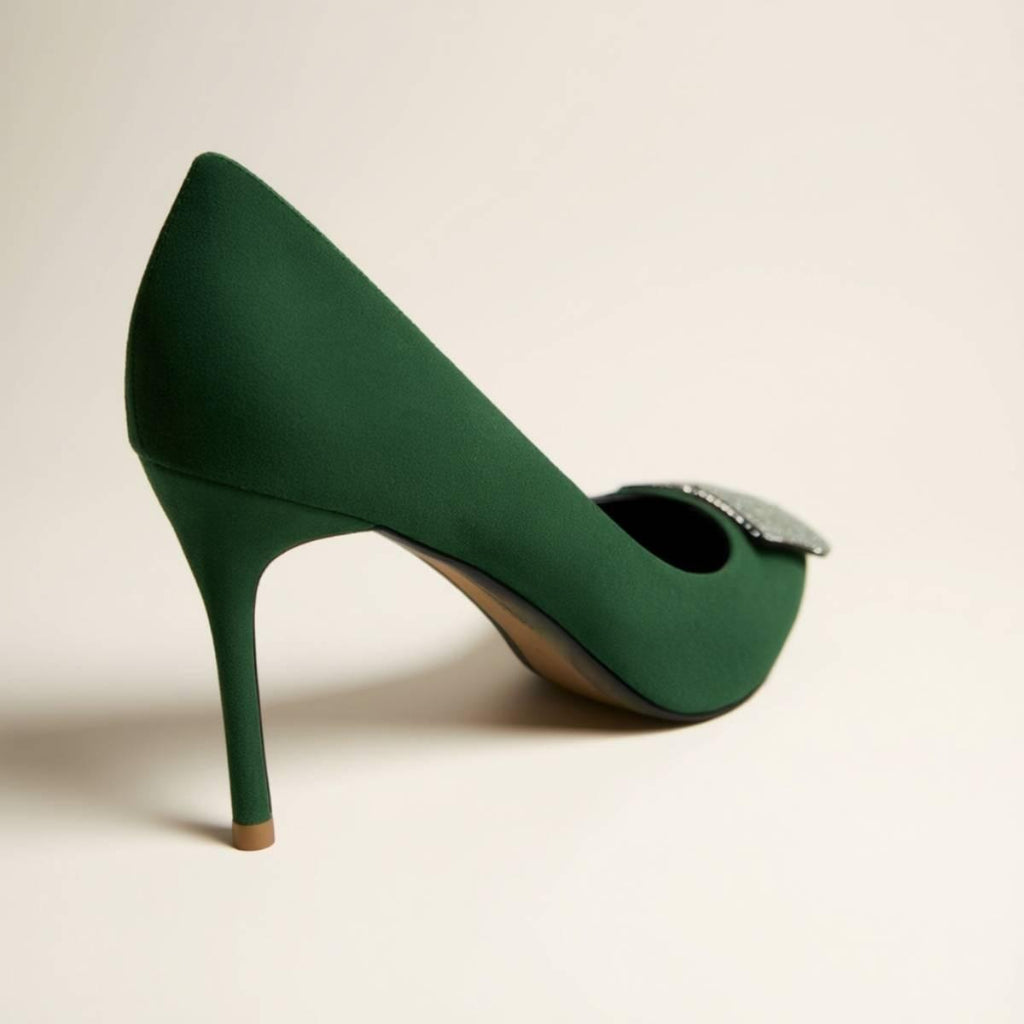 Side profile of Emerald Grace Stiletto showing elegant green suede texture and slender heel — luxury women’s fashion heel.