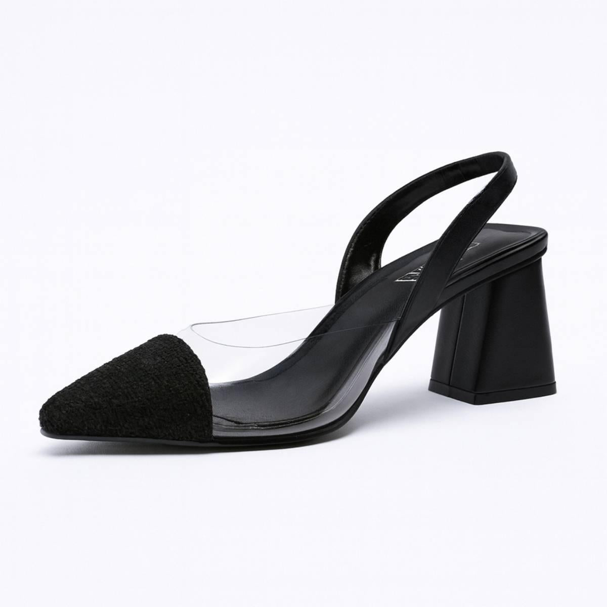 Single Lucent Noir Block Heel showcasing pointed toe, clear PVC detail, and structured heel