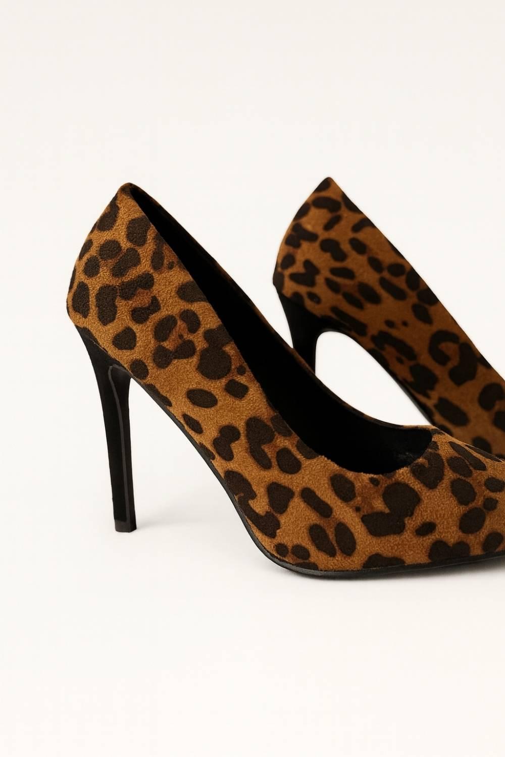 Oh! Divine Nia Wild Grace leopard print stilettos with pointed-toe design and high stiletto heel, radiating confidence and sophistication.