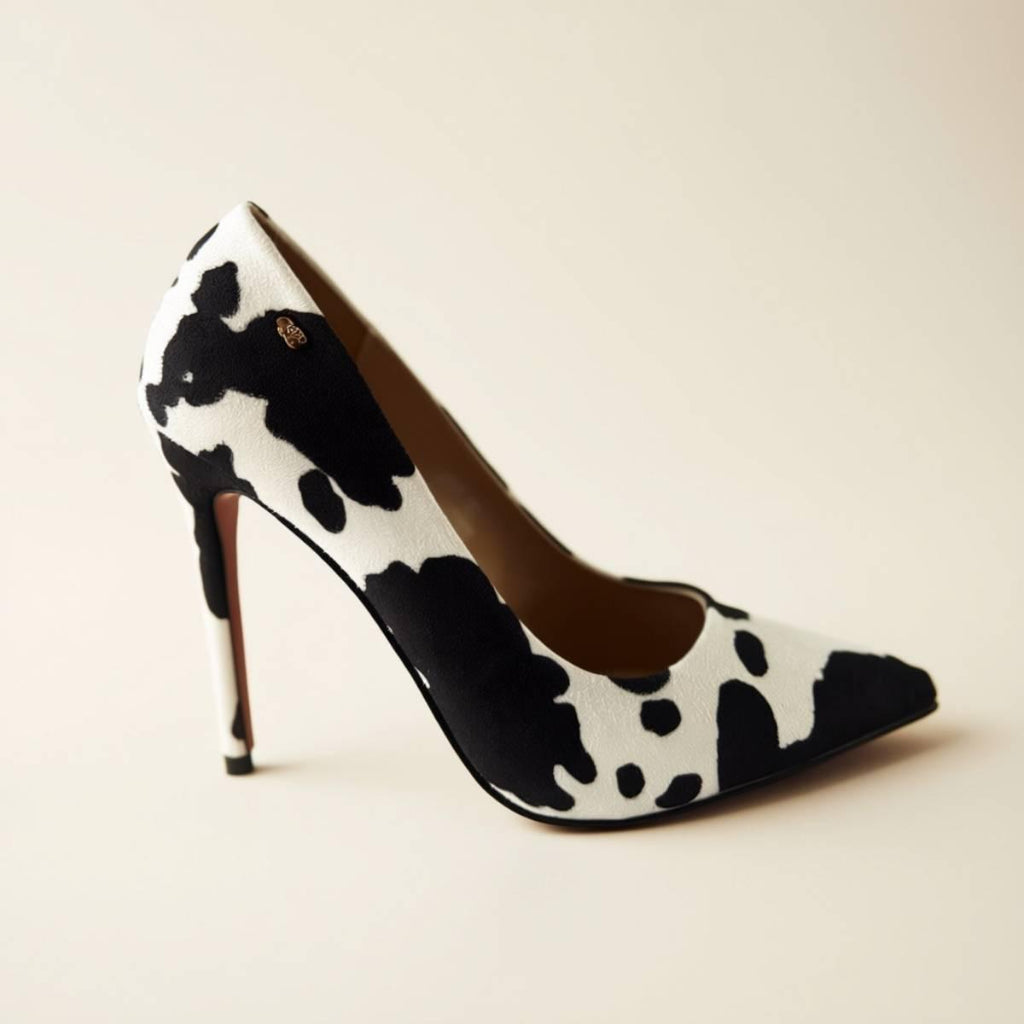 Left-side view of Noir Cowhide Stiletto in premium faux cowhide finish.