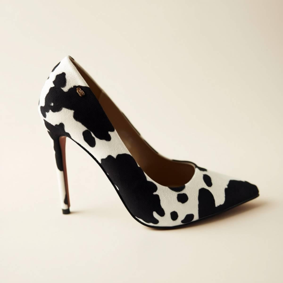 Left-side view of Noir Cowhide Stiletto in premium faux cowhide finish.