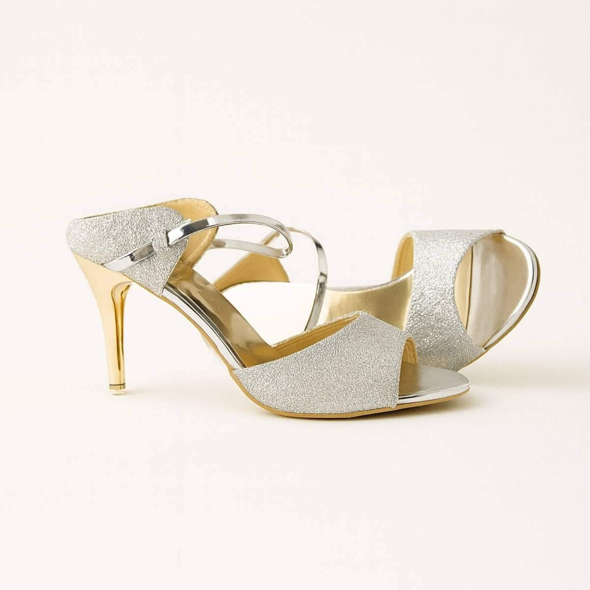 Dual-tone Nyla Gold Radiance Stiletto Heels showing glitter upper and polished metallic finish