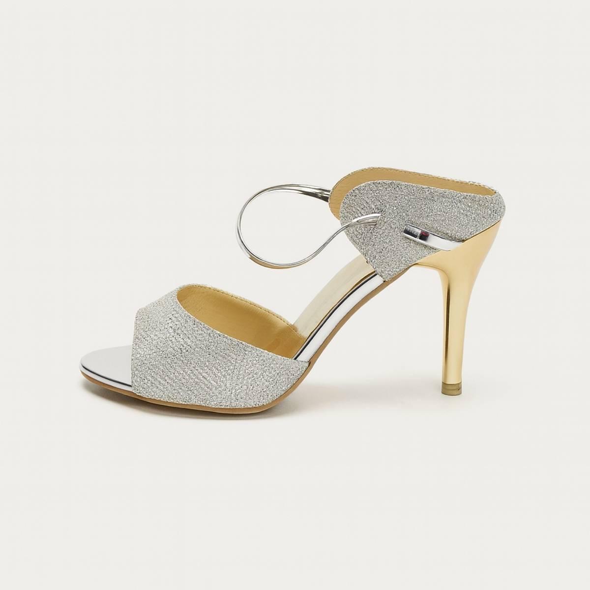 Metallic profile of Nyla Gold Radiance Stiletto Heel with elegant silver ankle strap and gold heel