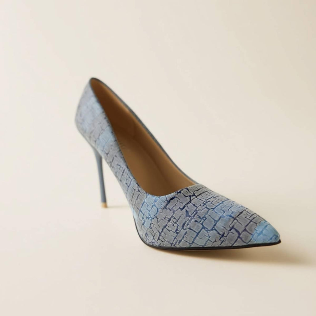 Side profile of Amara Textured Sky Heels featuring soft faux leather texture and elegant blue tones.