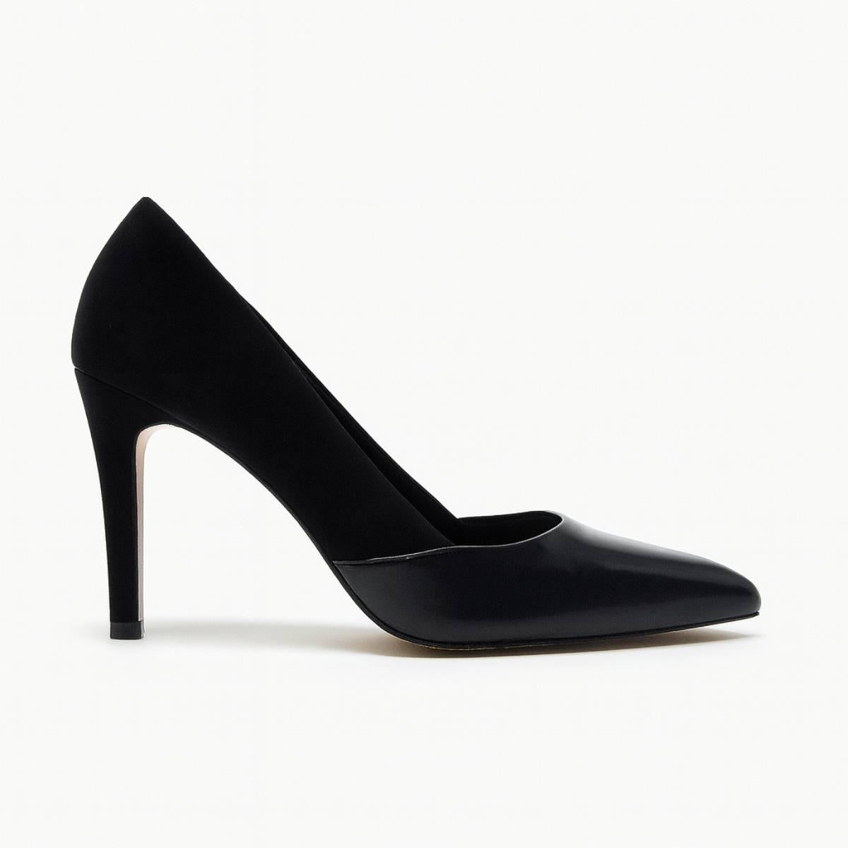 Close-up of Oh! Divine Aria Noir black heel highlighting soft suede texture and fine stiletto detailing.