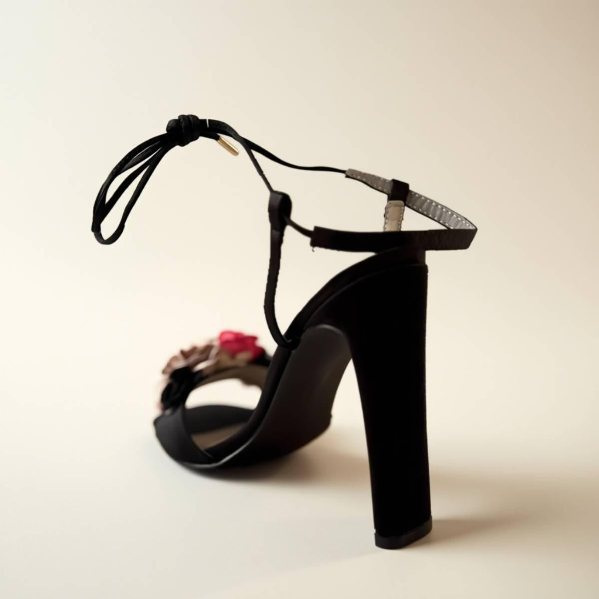 Back view of Oh! Divine black block-heel sandal with delicate ankle strap and gold buckle detail.