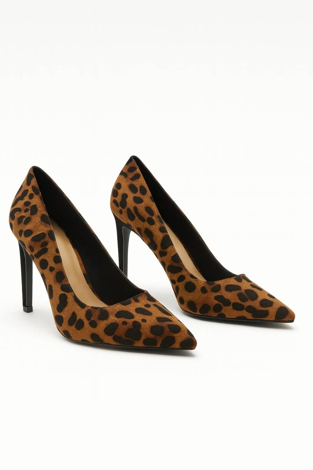 Oh! Divine Nia Wild Grace leopard print stilettos with pointed-toe design and high stiletto heel, radiating confidence and sophistication.