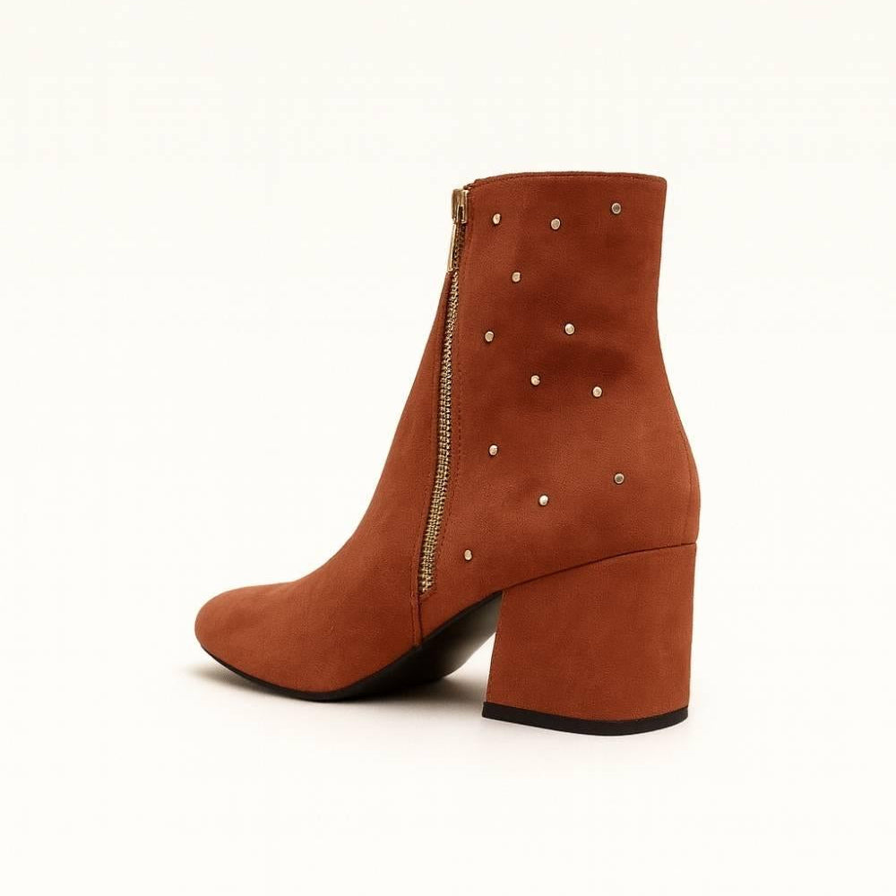 Rear angled view of Studded Block Heel Ankle Boot highlighting structured heel and gold studs