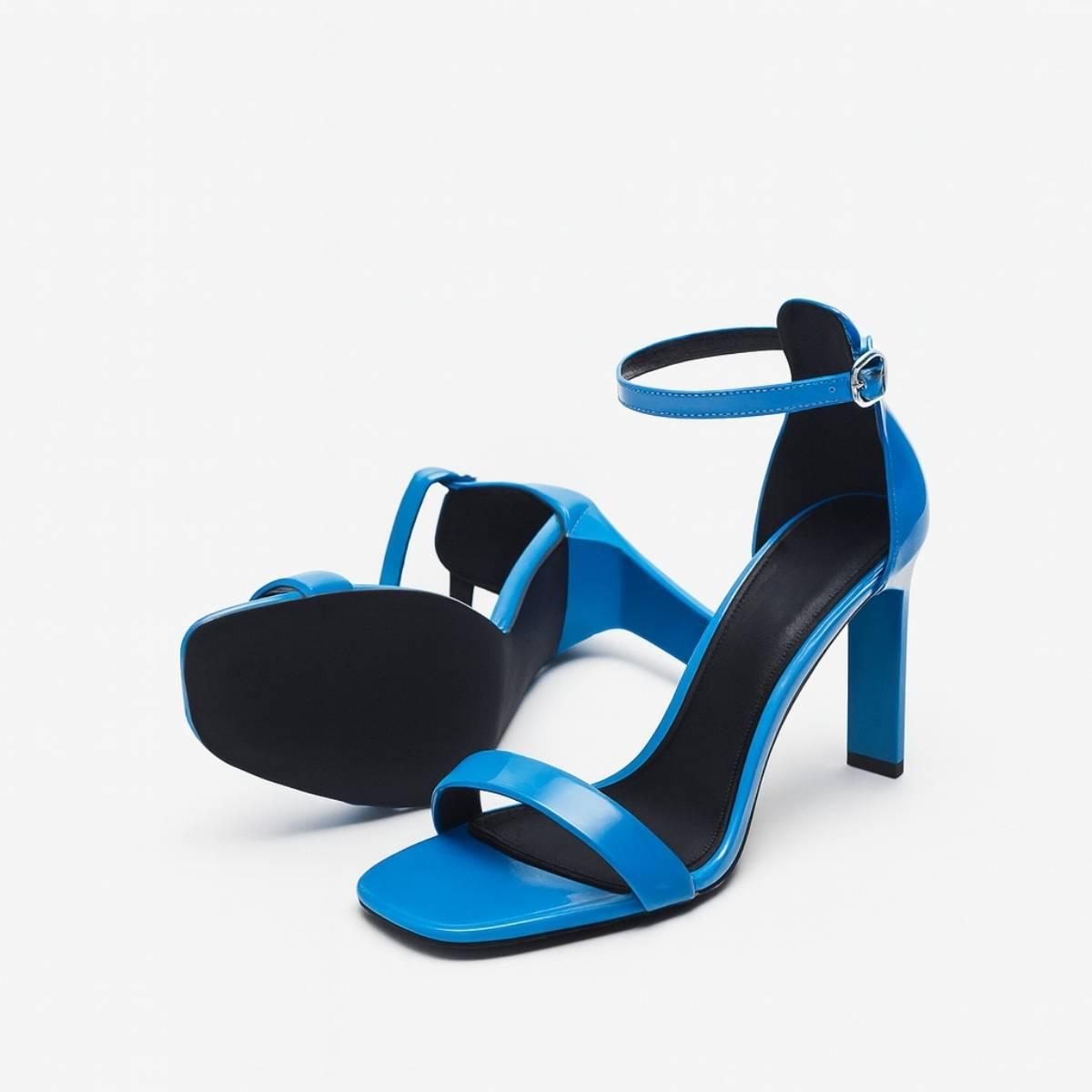 Side view of Oh! Divine Valentina Cobalt Blue Ankle-Strap Heels showing sleek stiletto silhouette and glossy patent finish