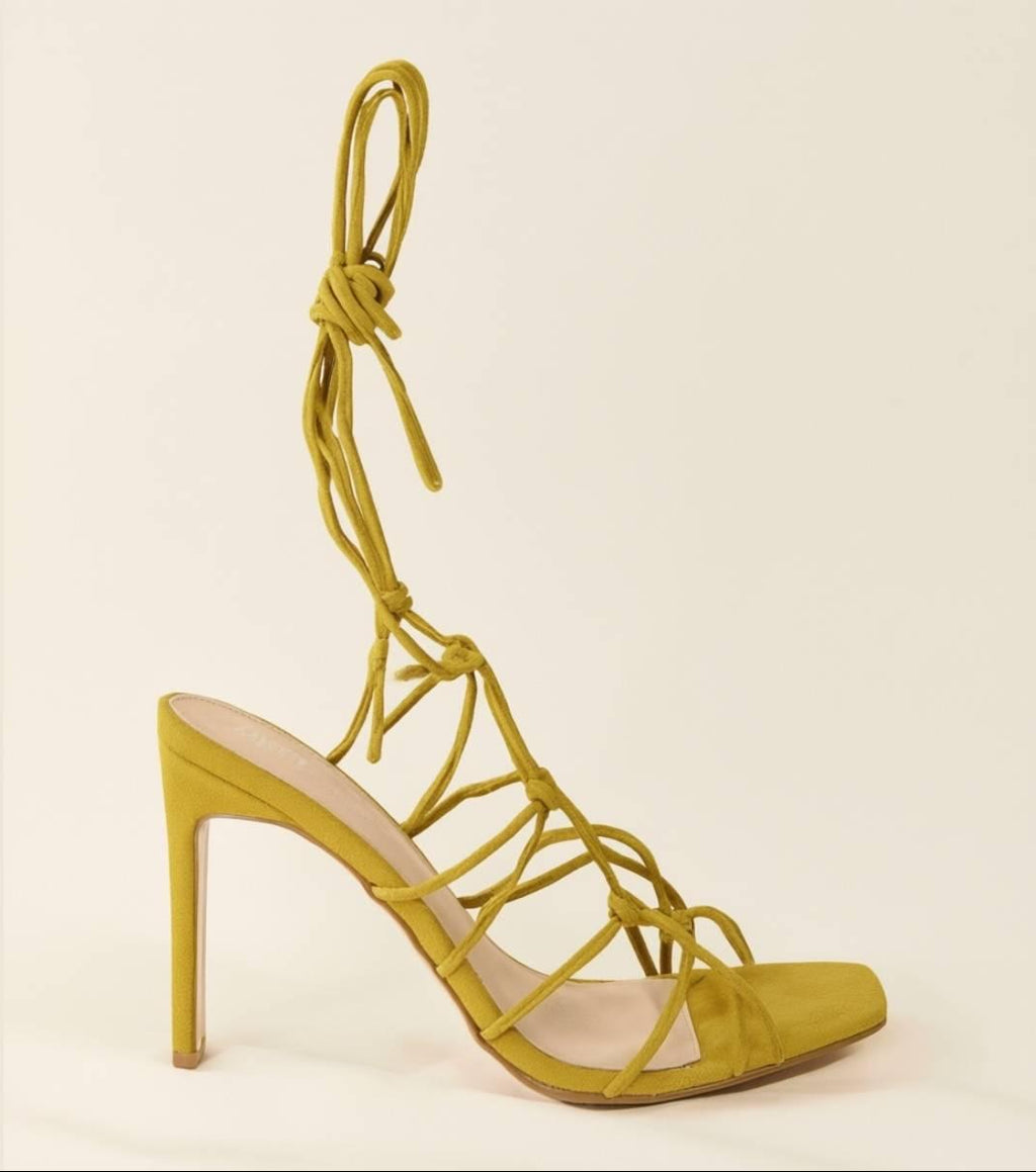 Full side view of Oh! Divine Zuri Mustard Lace Heels highlighting tall heel and open square toe structure