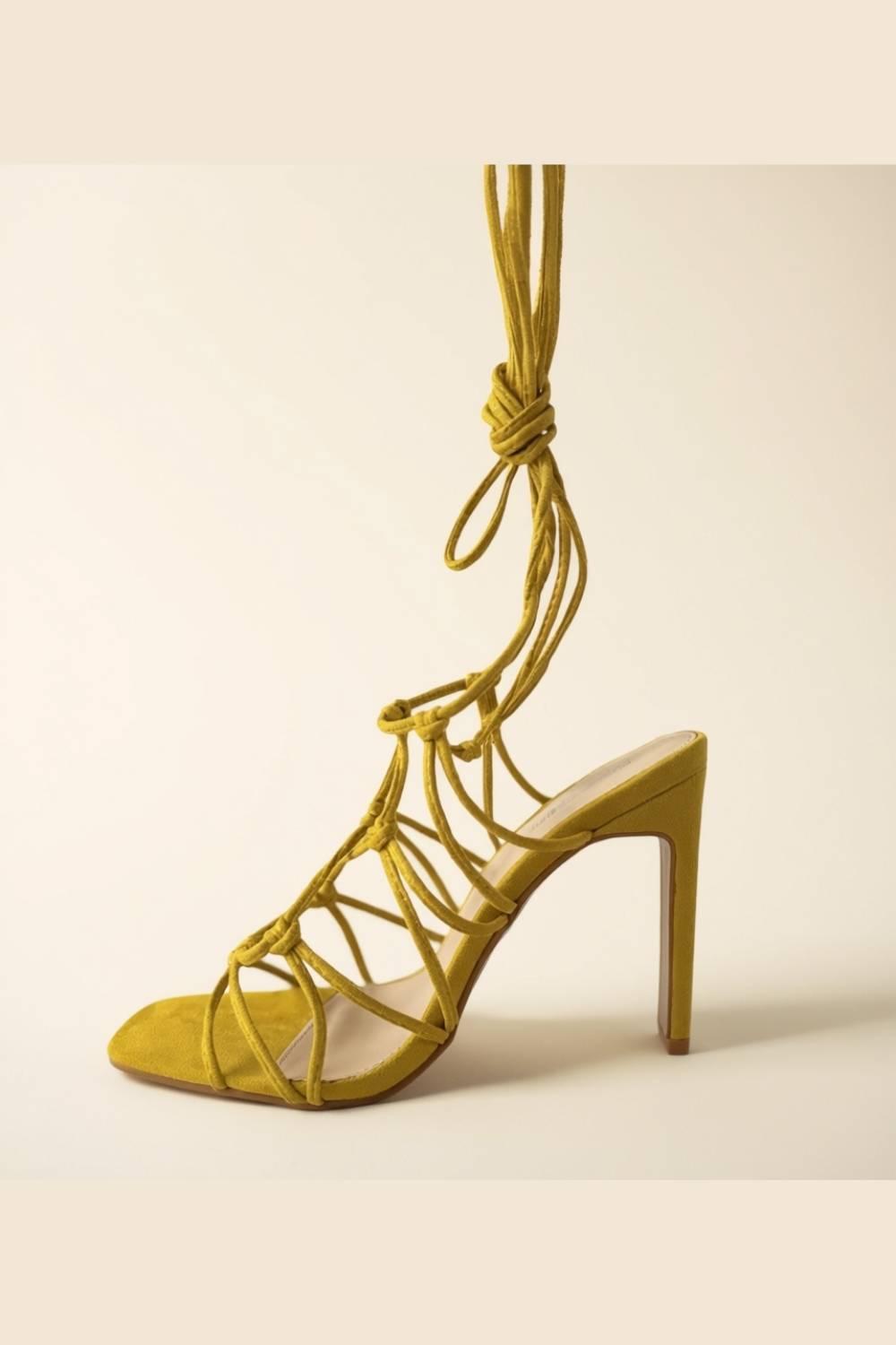 Stylish side view of Zuri Mustard Lace Heels featuring bold mustard hue and high-heel elegance